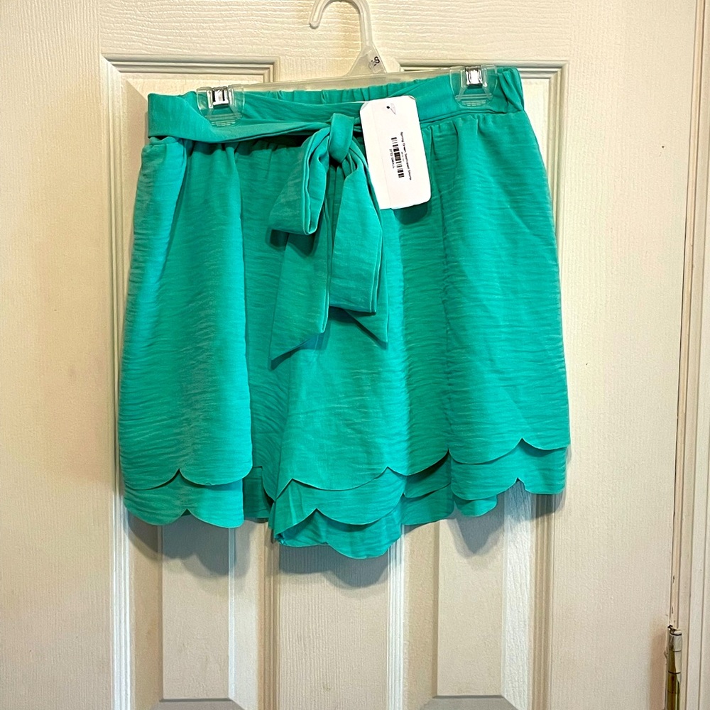 Green scalloped shorts. Small
